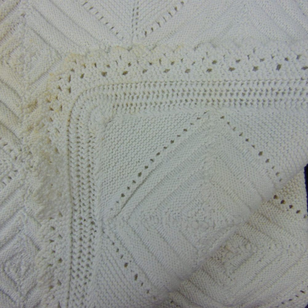 a portion of the counterpane baby blanket