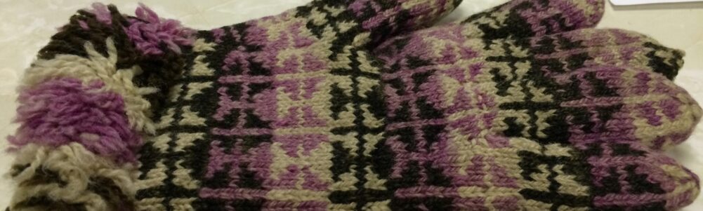 The knitted glove once owned by Herbert Wheeler. 