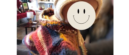 Beloved knitted bonnet on model Knitted wool bonnet on toddler model